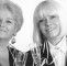 Wendy Richard posing in a New Year's celebration photo of Pat Butcher (played by Pam St. Clements) and Pauline Fowler (played by Wendy Richard) from "EastEnders"