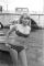 One of four photos of Wendy Richard leaning over the water