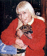 Wendy Richard embracing a greyhound, circa 1998.